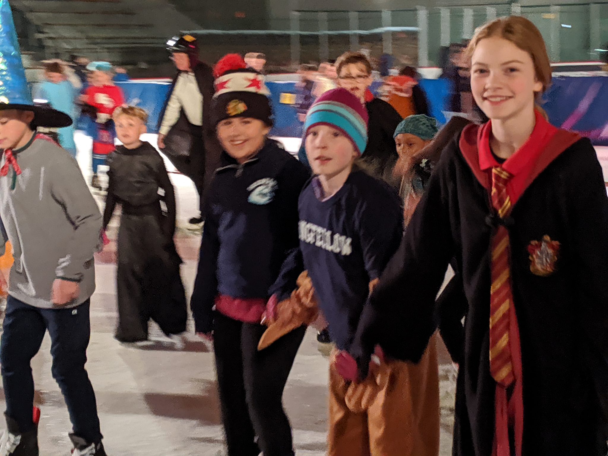 skaters in costume at the rink