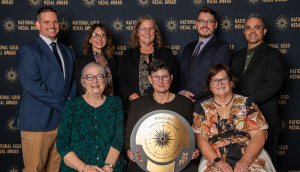 Park District of Oak Park leaders pose with National Gold Medal Award Finalist plaque