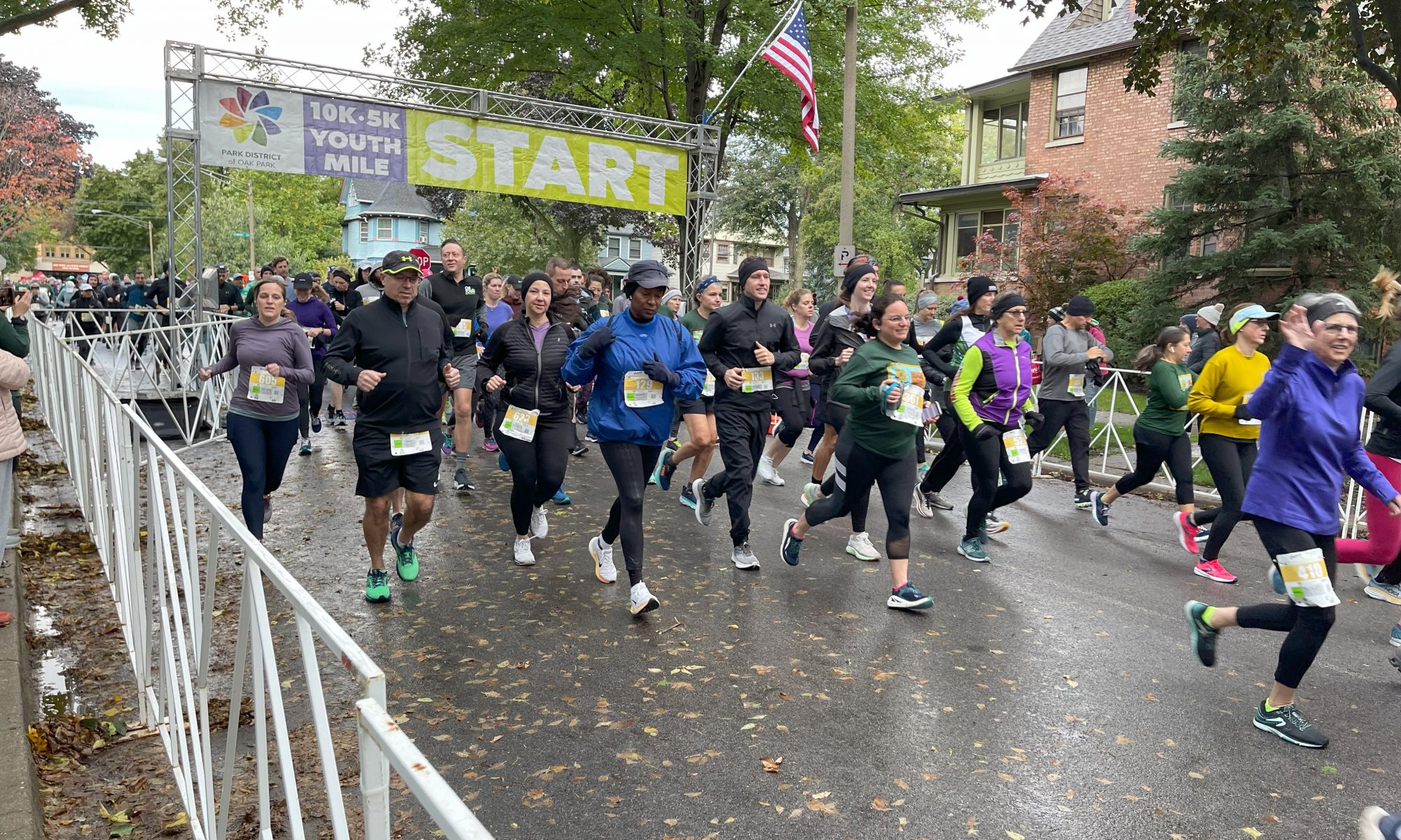 runners jog off the starting line