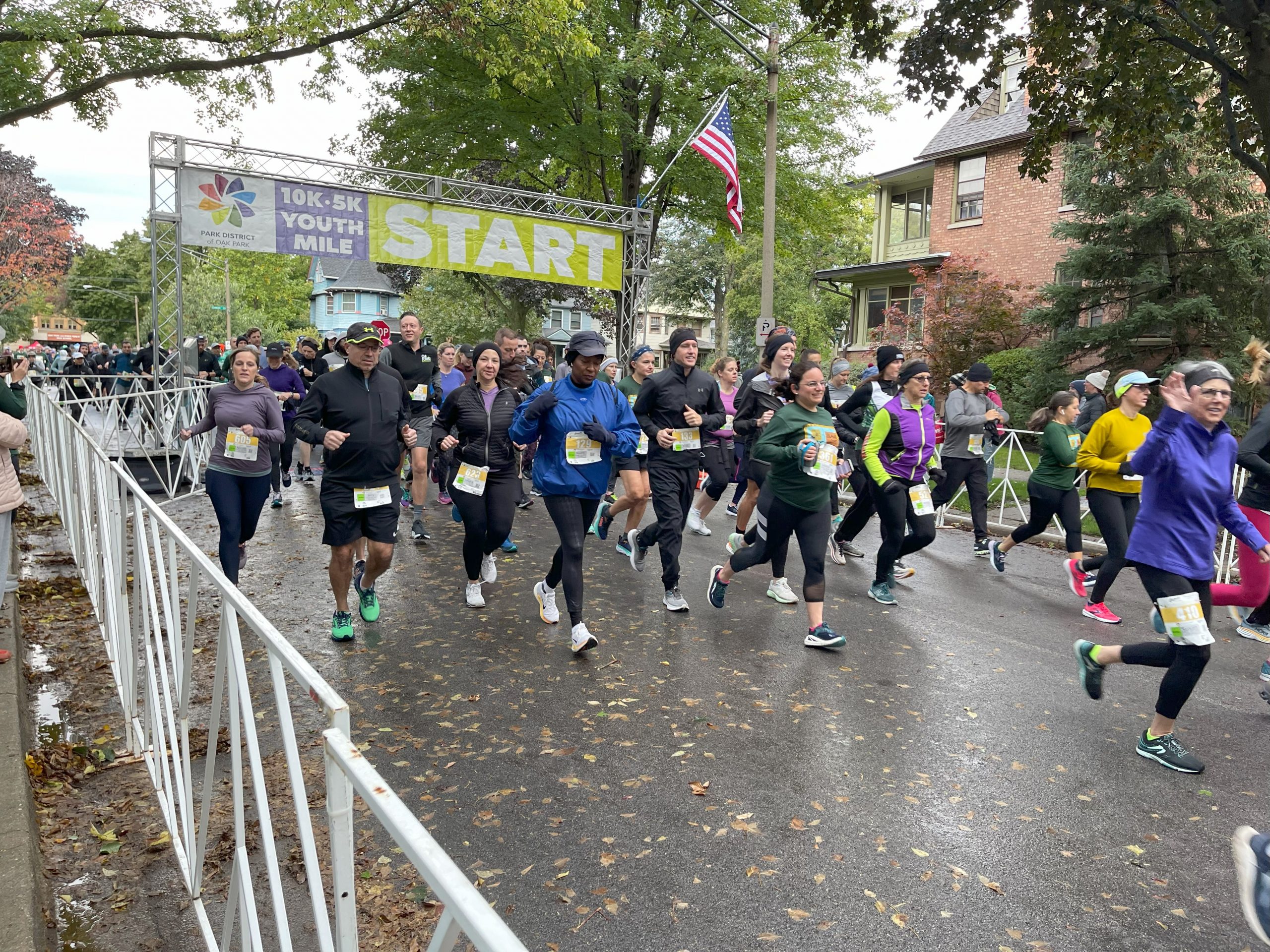 runners jog off the starting line