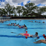 Lifeguards practice safety skills in the water
