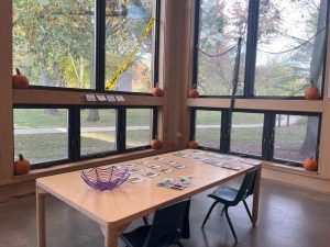 austin gardens table set up with halloween themed activities