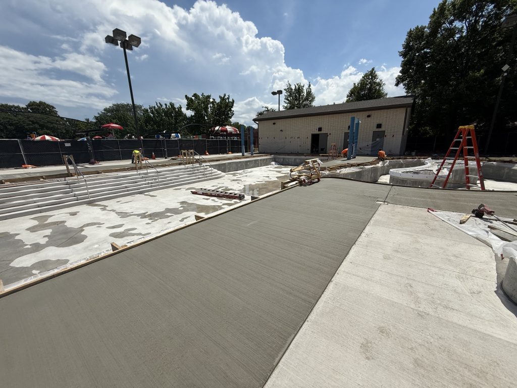smoothed concrete deck around pool