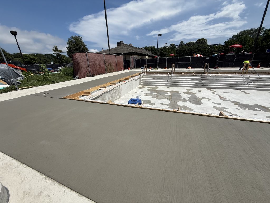 smoothed concrete deck at pool