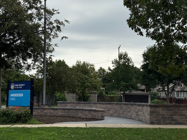 new andersen park entrance with brick walkway