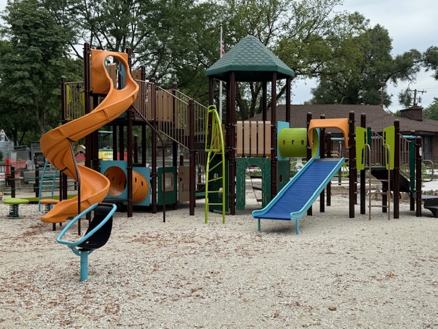 new playground equipment intermixed with existing equipment
