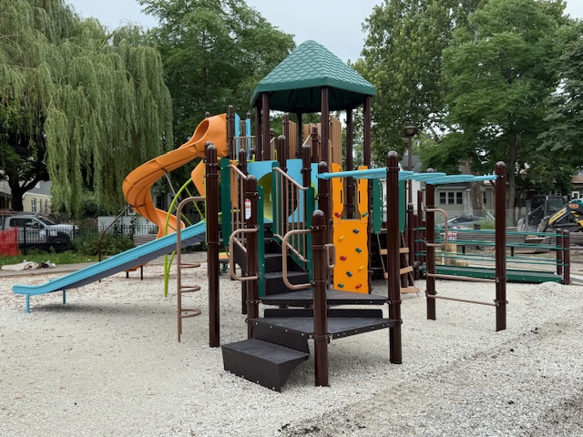 new playground equipment intermixed with existing equipment