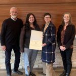 Park District staff pose with official Illinois Distinguished Agency Accreditation certificate